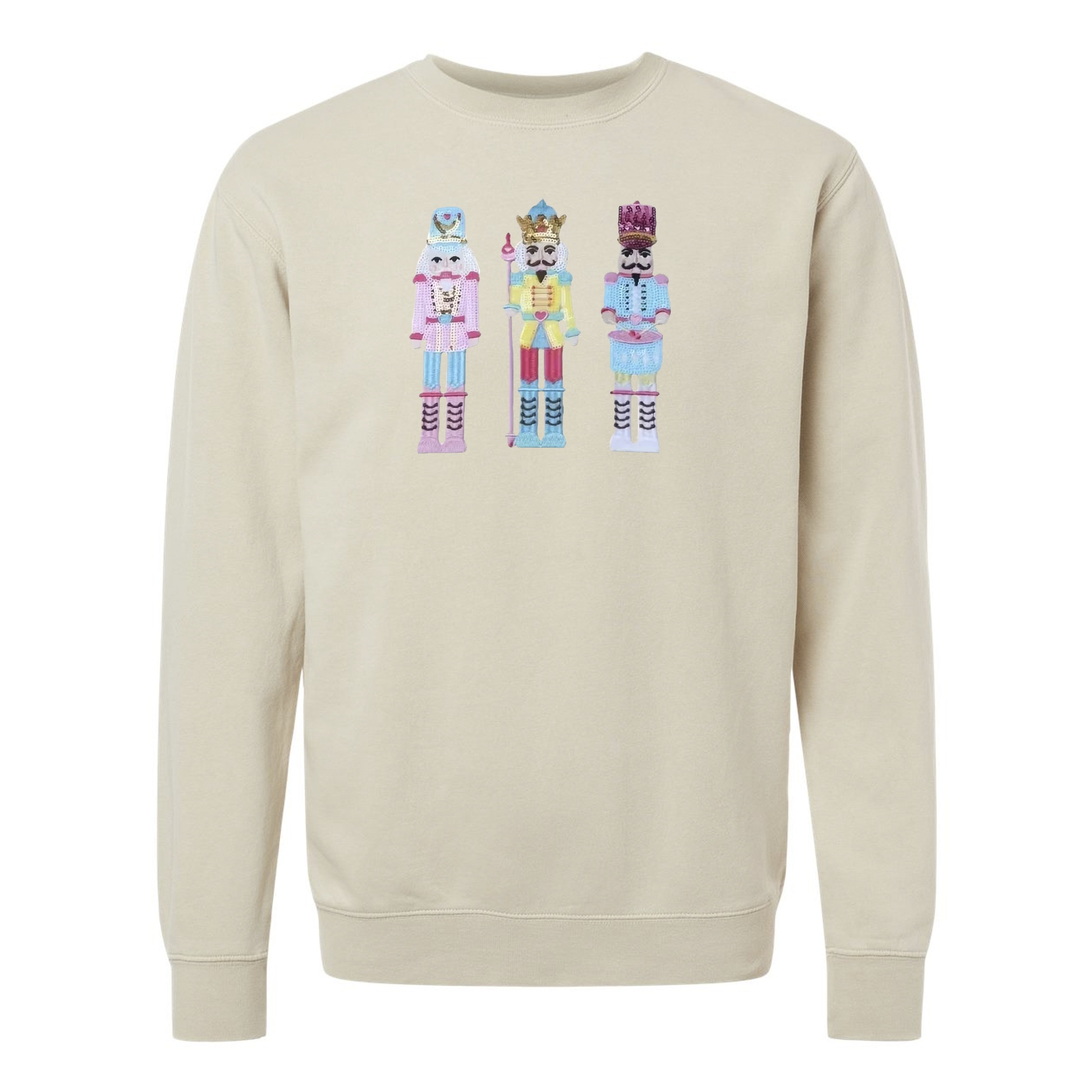 Beige sweatshirt with colorful nutcracker design on a white background